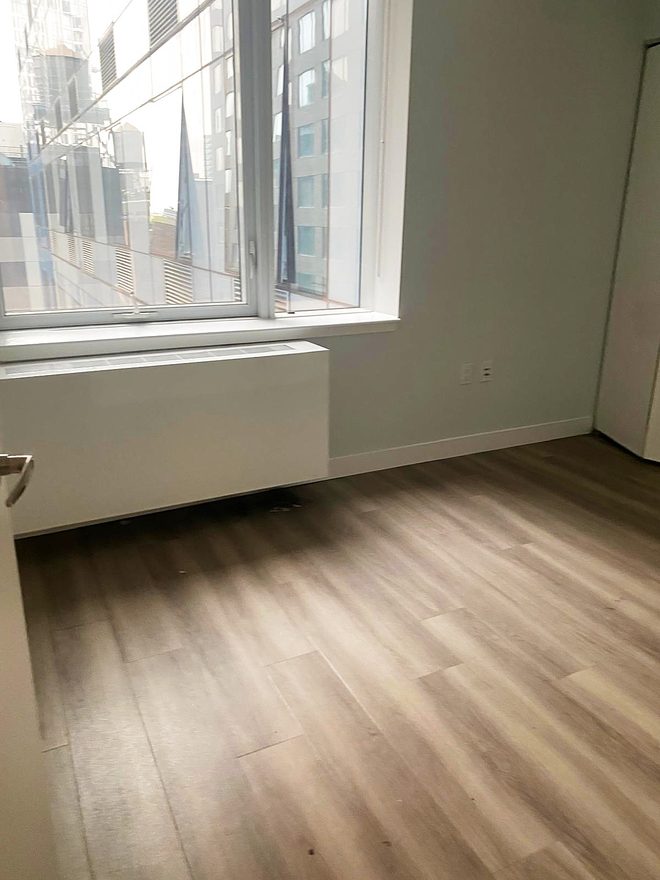 A clean window wall and sill with daylight coming through
