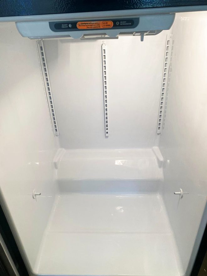 A second view of the clean, empty freezer compartment